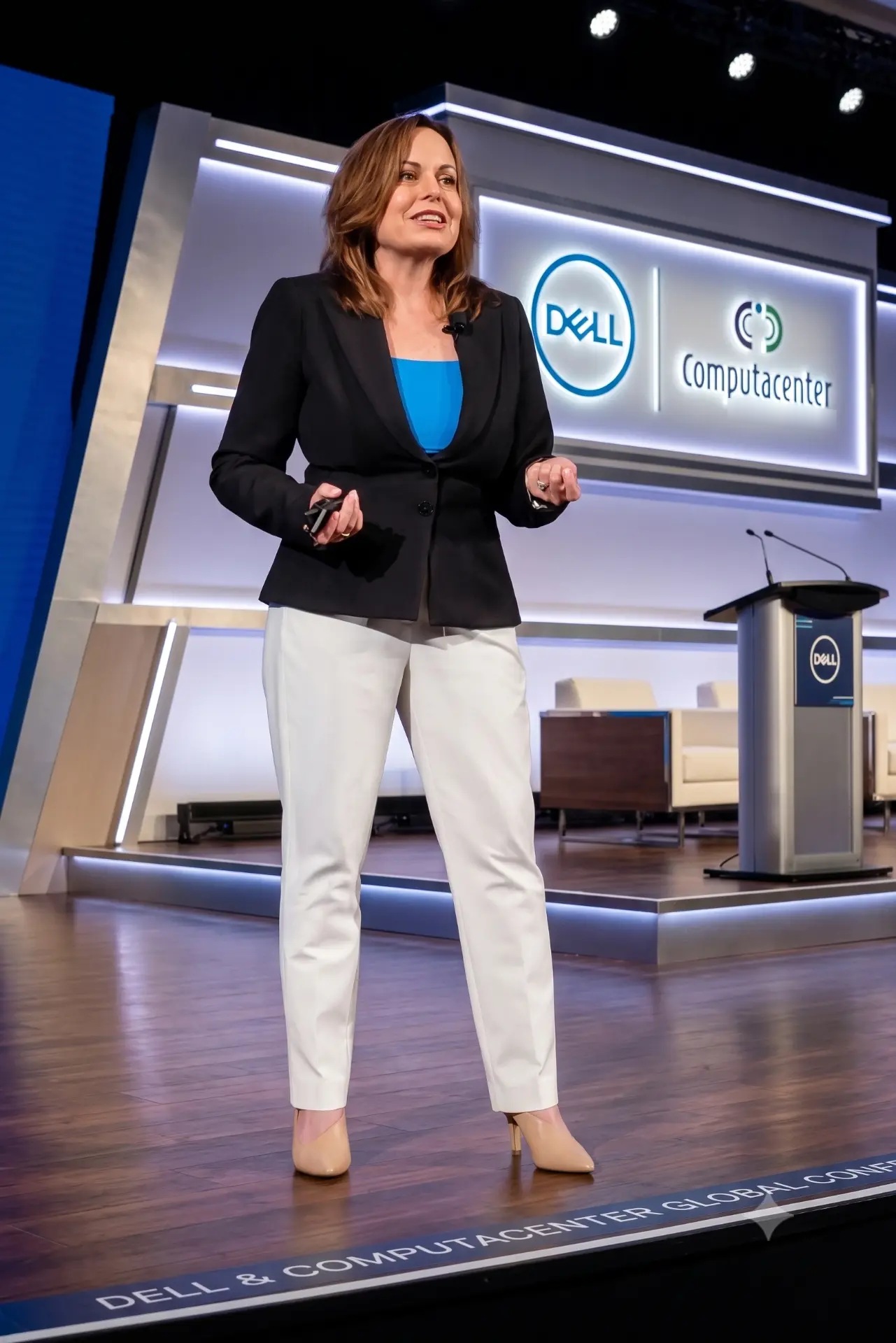 Dr. Lisa Palmer speaking on a Dell and Computacenter stage